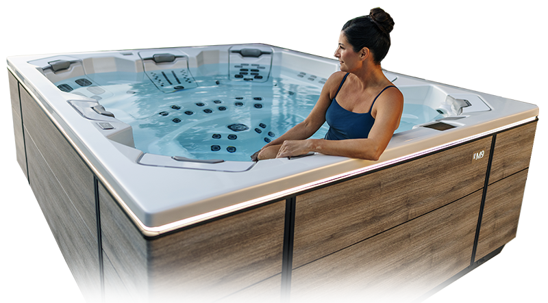 Woman relaxing in a Bullfrog M9 hot tub